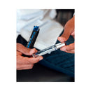 Eye of Love Unscented Male Pheromone Parfum 10 ml bottle held in hands against a blurred background.