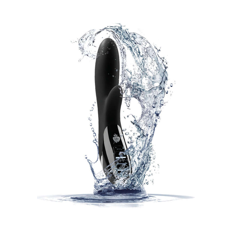 Mystim Daring Danny E-Stim Vibrator splashing in water, showcasing luxury design and powerful stimulation.