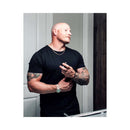 Man applying Eye of Love Matchmaker Black Diamond Attract Her Parfum 1 Oz in a modern bathroom setting.