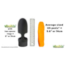 ViBalldo Black Vibrating Penis Sleeve with two spacer rings and size comparison to average US penis and carrot.