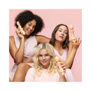 Three women posing with VUSH Majesty 2 Wand Vibrator, showcasing its sleek design and versatility.