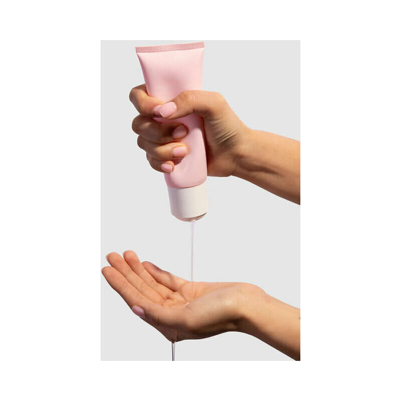VUSH Feelin Myself Intimate Gel 3.4 Oz being poured into a palm for smooth application.