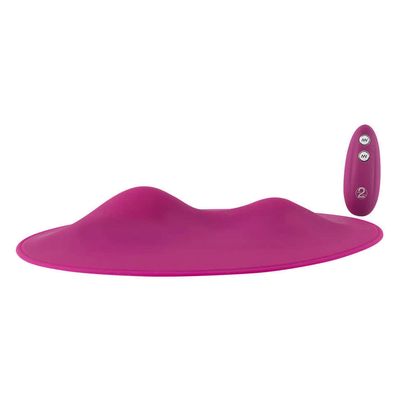 VibePad Hands Free External Vibrator in a vibrant pink color, showcasing its innovative design for hands-free pleasure.