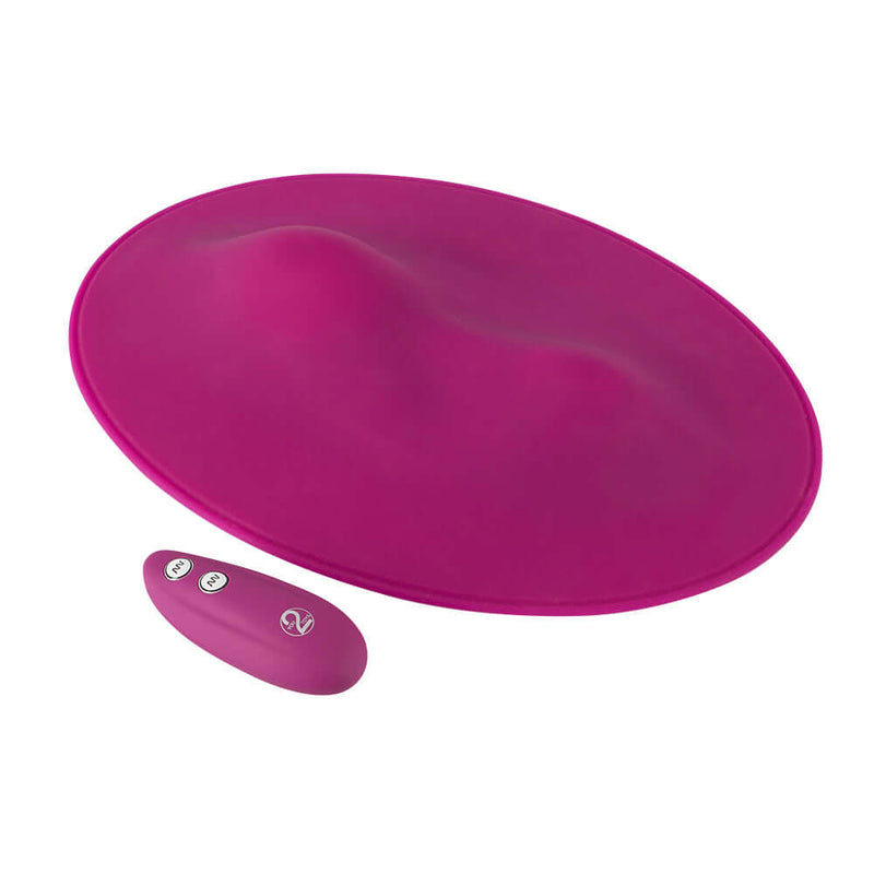 VibePad Hands Free External Vibrator in pink silicone with remote control for innovative hands-free stimulation.