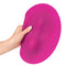 VibePad Hands Free External Vibrator being held with a focus on its unique shape and soft texture.