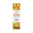 Exsens Body Oil Amber Jojoba 3.4 Oz bottle with amber crystals and organic moisturizing formula.