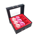 It's The Bomb Soap Bud Rose Petals Soap Set in a black box with rose petal shaped soaps.