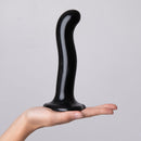 Strap-On-Me P & G-Spot Silicone Dildo Black Small held in hand, showcasing its ergonomic design and smooth finish.