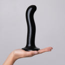 Strap-On-Me P&G-Spot Silicone Dildo Large Black held in hand, showcasing its ergonomic design and sleek finish.