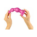 Strap-on-me Dildo Plug Beads Small Raspberry held in hands, showcasing its beaded design and ergonomic features.