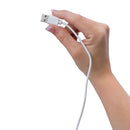 A hand holding the USB end of the Screaming O Recharge Charging Cable for easy access.