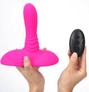 Maia Adira Pink Thrusting Vibe Pad with Remote Control held in hands.