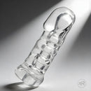 Master Series Girth Enhancing Penetration Sleeve Clear showcasing its thick walls and ribbed interior design.