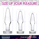 Dosha 3 Piece Glass Anal Plug Kit showcasing three graduated glass plugs with measurement details.