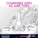 Dosha 3 Piece Glass Anal Plug Kit showcases clear plugs compatible with all lube types against a fluid background.