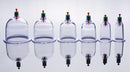 Master Series Sukshen 6 Piece Cupping Set displays six clear cupping cups in graduated sizes for suction therapy.