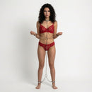 Master Series 5 Piece Stainless Steel Shackle Set Large displayed on model in red lace lingerie with chains.