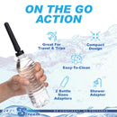 CleanStream Travel Enema Water Bottle Adapter Set with hand holding a water bottle for on-the-go hygiene.