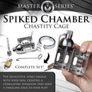 Master Series Spiked Chamber Chastity Cage with spikes and locking components for intense sensation and control.