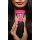 Lickgasm Mini 10X Silicone Licking and Sucking Stimulator held by a woman, highlighting its sleek design and sensations.
