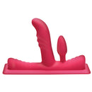 LoveBotz 50X Saddle Pro Sex Machine with 4 Attachments in vibrant pink silicone with unique designs.