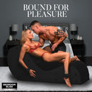 Bedroom Bliss Bondage Love Couch Sex Furniture Black used by a couple in intimate play, highlighting comfort and restraint.