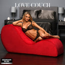 Bedroom Bliss Love Couch Chaise Lounge Sex Furniture in red with a model reclining comfortably.