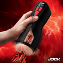 Jock Banger Sucking and Vibrating Pussy Masturbator in hand, showcasing suction and vibration features.
