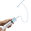 CleanStream Enema Syringe with Tube 300ml Clear in use with water spraying,