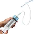 CleanStream Enema Syringe with Tube 550ml Clear in use, showing syringe and attached silicone tube.