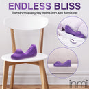 Inmi Ride n' Grind 10X Vibrating Silicone Sex Grinder on a chair, showcasing its unique design for pleasure.