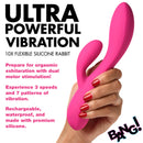 10X Flexible Silicone Rabbit Vibrator Pink held in hand, showcasing its ergonomic design for dual stimulation.