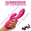10X Flexible Silicone Rabbit Vibrator Pink held in hand, showcasing size and design features for dual stimulation.