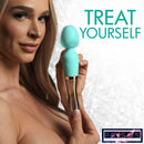 10X Turquoise Dual Ended Silicone and Glass Wand held by model, showcasing its dual textures and design.