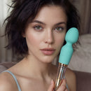 10X Turquoise Dual Ended Silicone and Glass Wand showcased by a model, highlighting its soft silicone head and glass handle.