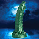Cockness Monster Lake Creature Silicone Dildo in iridescent green against a moonlit lake.