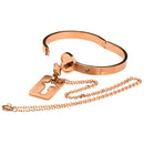 Cuffed Locking Bracelet and Key Necklace Rose Gold set displayed elegantly, featuring a cuff bracelet and key necklace.