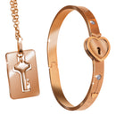 Cuffed Locking Bracelet and Key Necklace Rose Gold set featuring a heart-shaped bracelet and key pendant.