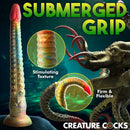 Tenta-Dick Tentacle Silicone Dildo showcasing stimulating texture and firm yet flexible design in a mystical underwater setting.