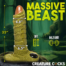 Creature Cocks Scaly Swamp Monster 3 Foot Giant Dildo showcasing dimensions and details against a swamp backdrop.