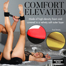 Bedroom Bliss Red Heart Bondage Love Pillow shown in use, featuring high-density foam and velvety soft outer layer.