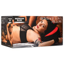 Bedroom Bliss Red Heart Bondage Love Pillow packaging featuring a sensual scene with a woman and man.