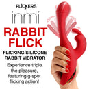 Inmi Flicking Silicone Rabbit Vibrator Red in a hand showcasing its dual-action G-spot flicking and rabbit ear stimulation.