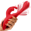 Inmi Flicking Silicone Rabbit Vibrator Red being held, showcasing its dual-action functionality and flicking motion.