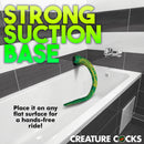 Creature Cocks Titan Tentacle Extra Long Silicone Dildo with strong suction base in a bathtub for hands-free use.