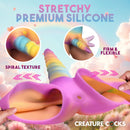 Close-up of the Creature Cocks Unicorn Silicone Strap-On Shorts, showcasing the colorful unicorn horn and stretchy silicone material.