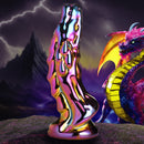 Creature Cocks Dragon Glass Dildo Metallic Yellow Pink showcasing iridescent design next to a colorful dragon.