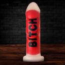 Master Series Bitch 7 Inch Ribbed Silicone Dildo featuring ribbed texture and vibrant red color.