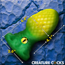 Eye of the Dragon Silicone Butt Plug Green with dragon-scale texture and glass eye, dimensions shown.