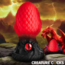 Creature Cocks Eye of the Dragon Silicone Butt Plug Red with dragon-scale texture and glass eye.